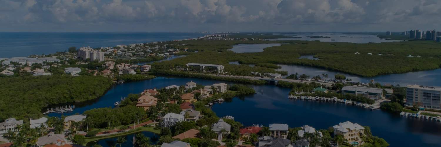 Aerial view of waterfront estates in Naples, Florida